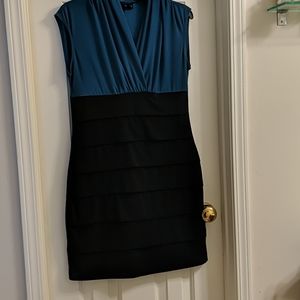 Black and blue form fitting dress